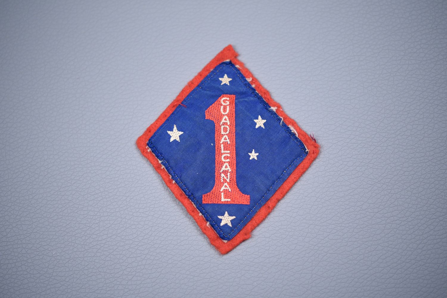 WWII U.S. 1st MARINE DIVISION 'BLOODED' SHOULDER PATCH - AUSTRALIAN MADE