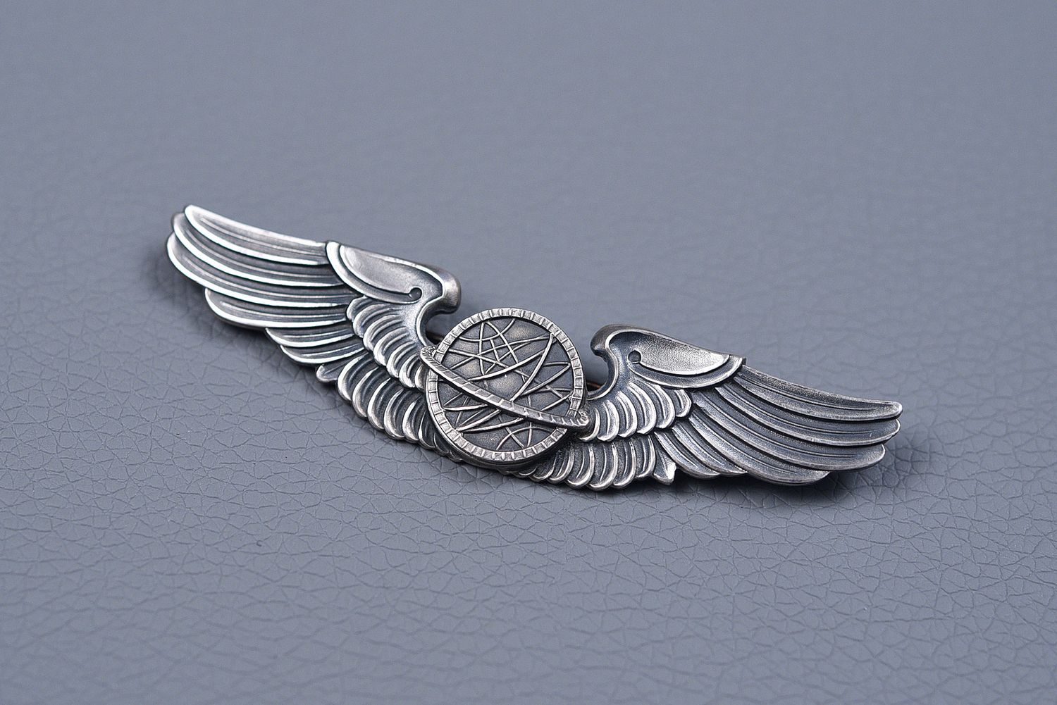 WWII U.S. ARMY AIR CORPS NAVIGATOR WING BY BALFOUR w/RIVETED CENTER - PIN BACK, STERLING WWII U.S. ARMY AIR CORPS NAVIGATOR WING BY BALFOUR w/RIVETED CENTER - PIN BACK, STERLING