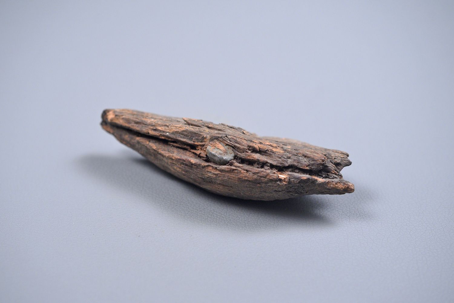 CIVIL WAR .58 CALIBER MINIE BALL IN WOOD CIVIL WAR .58 CALIBER MINIE BALL IN WOOD