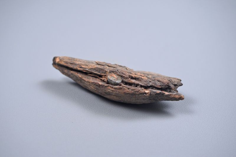 CIVIL WAR .58 CALIBER MINIE BALL IN WOOD CIVIL WAR .58 CALIBER MINIE BALL IN WOOD