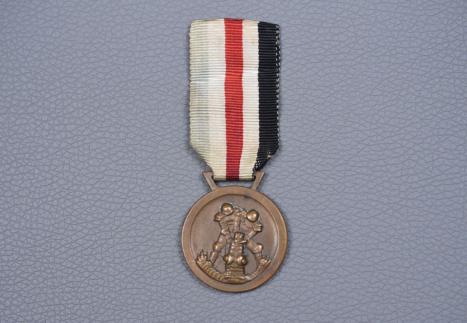 WWII GERMAN AFIKA CAMPAIGN MEDAL ON ORIGINAL RIBBON