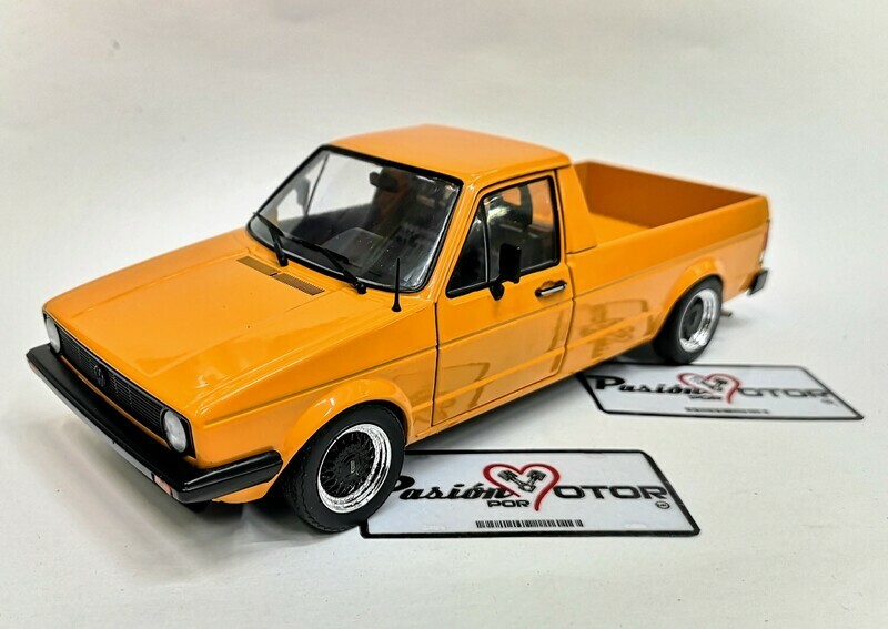 1:18 Volkswagen Caddy Pick Up MKI Custom 1982 Naranja SOLIDO