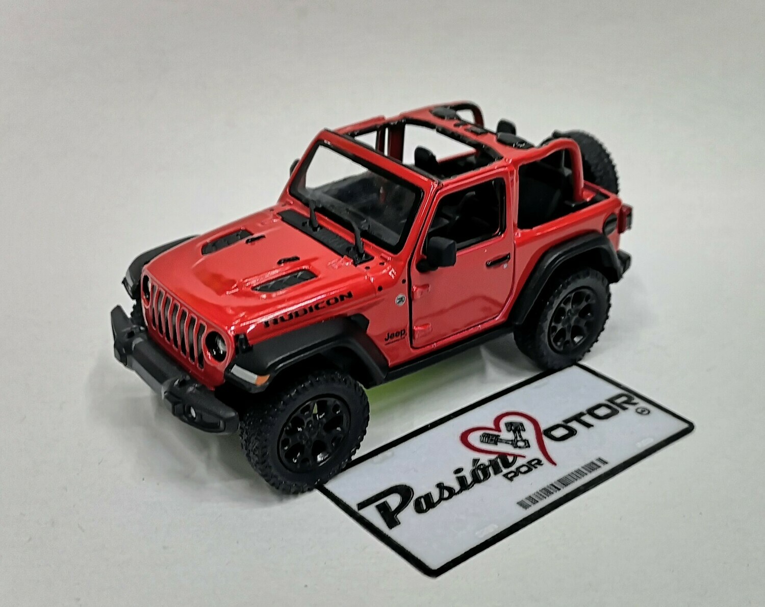 1:34 Jeep Wrangler Rubicon Open Top 2018 Rojo
 Kinsmart En Display / A Granel 1:32