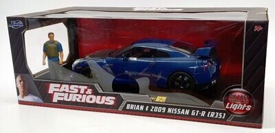 1:18 Nissan GT-R R35 2009 Azul con luz + Figura Brian´s Rapido y Furioso 7 JADA TOYS 02449
