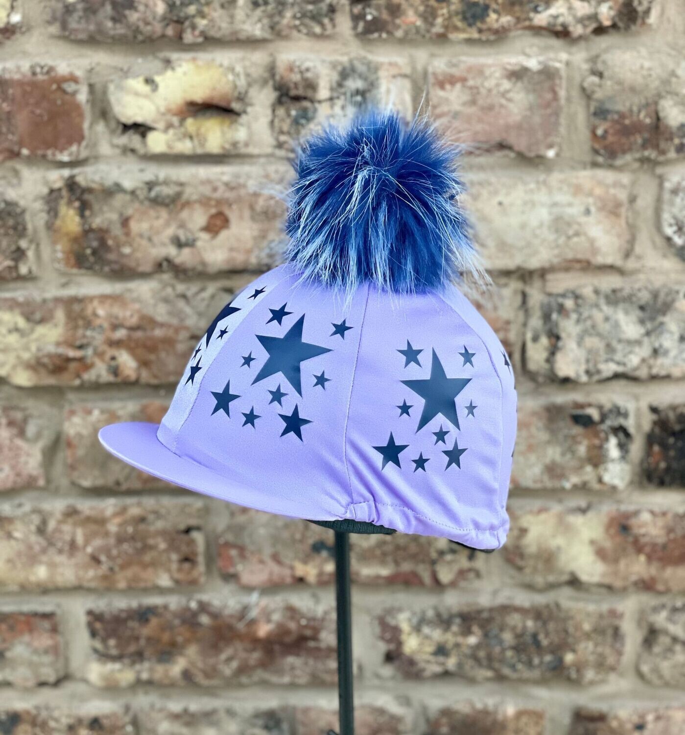 Pompops Lavender Hat Silk with Navy Star detail and Faux fur pompom