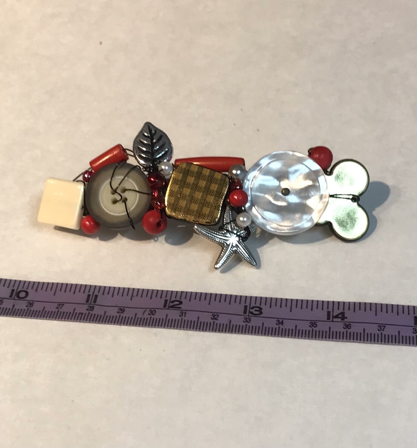 BARRETTE DORÉE ROUGE