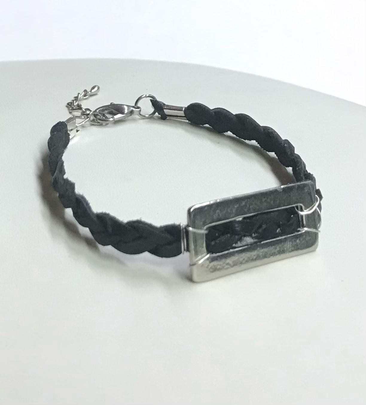 BRACELET TRESSÉ NOIR MÉTALLIQUE