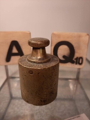 ​A nice button weight with calibration mark.