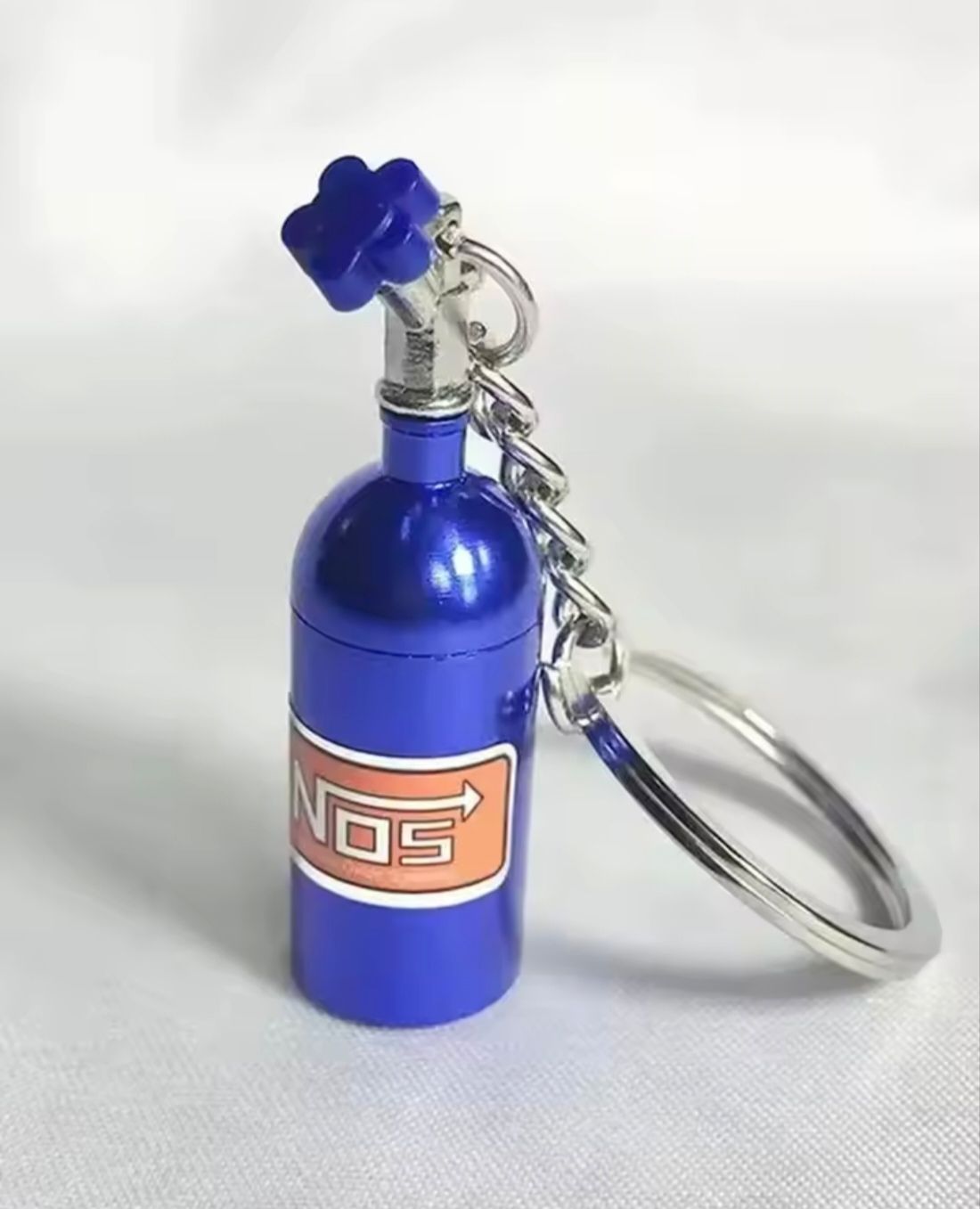 Avaimenperä NOS pullo