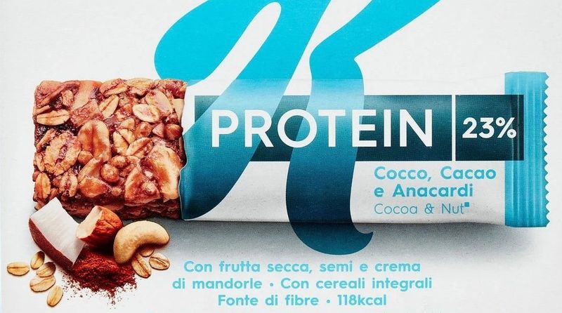 Snack Kellogg's Higt Protein Cocco, Cacao, Anacardi 35g - fuori tutto Snack Kellogg's Higt Protein Cocco, Cacao, Anacardi 35g - fuori tutto