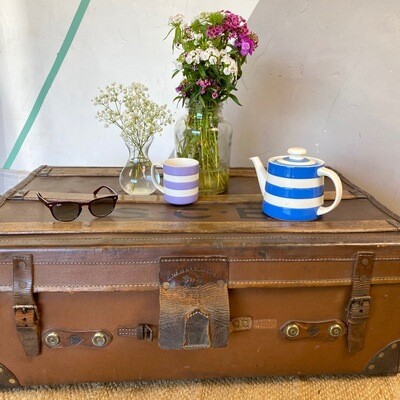 Vintage leather travel trunk coffee table