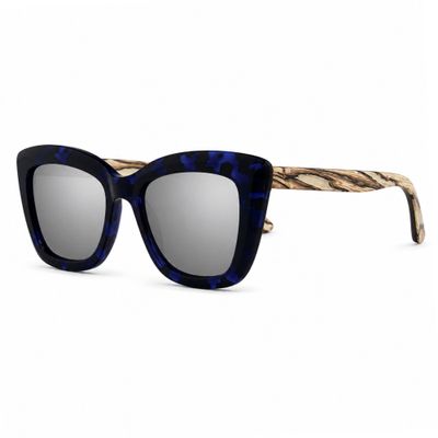 Blue Noir polarized sunglasses with cobalt-black tortoise frame, silver lenses and white ebony temples