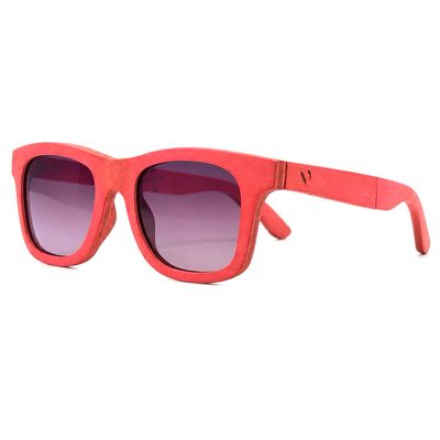 Radial Blush polarized wood sunglasses with blush-pink frame and purple gradient lenses