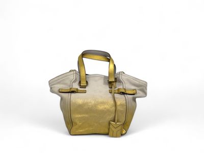 YVES SAINT LAURENT a spalla oro