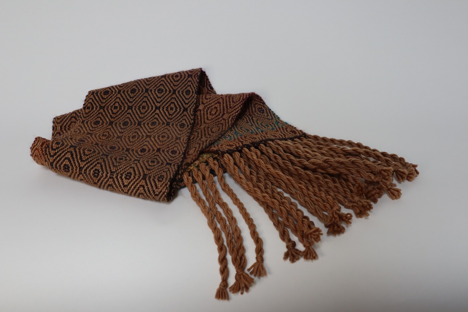 Walnut hull dyed scarf with jewel colored weft