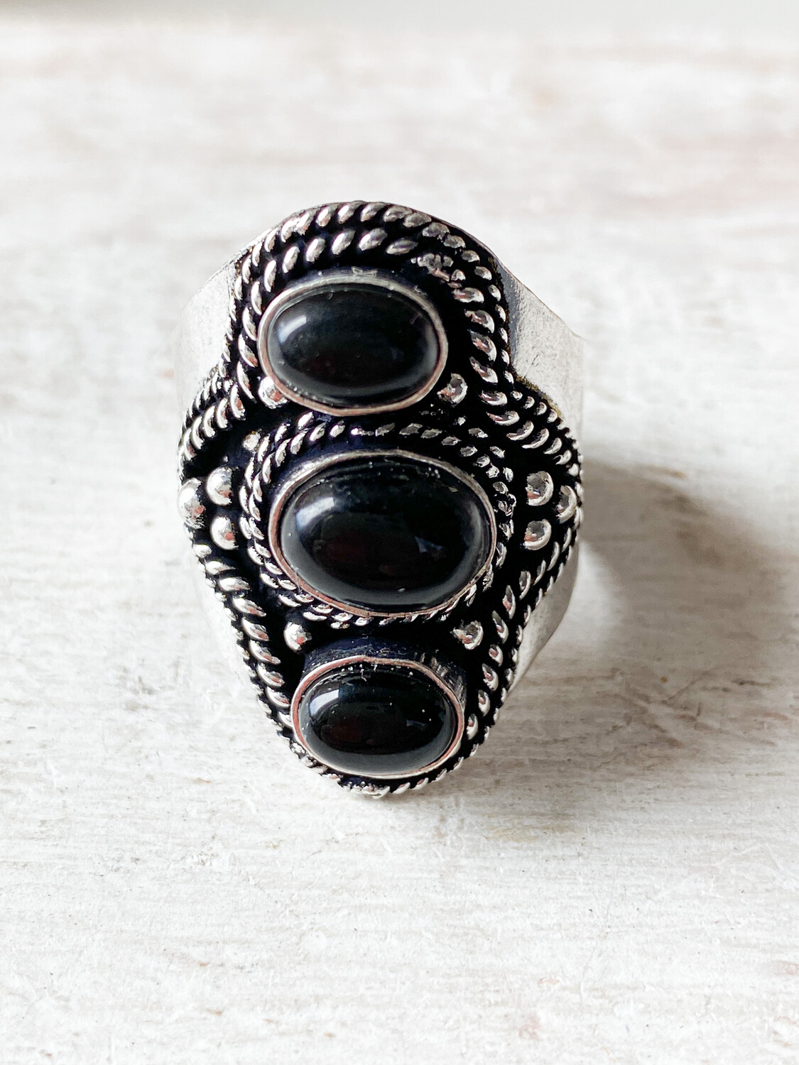 Anillo latón triple negro