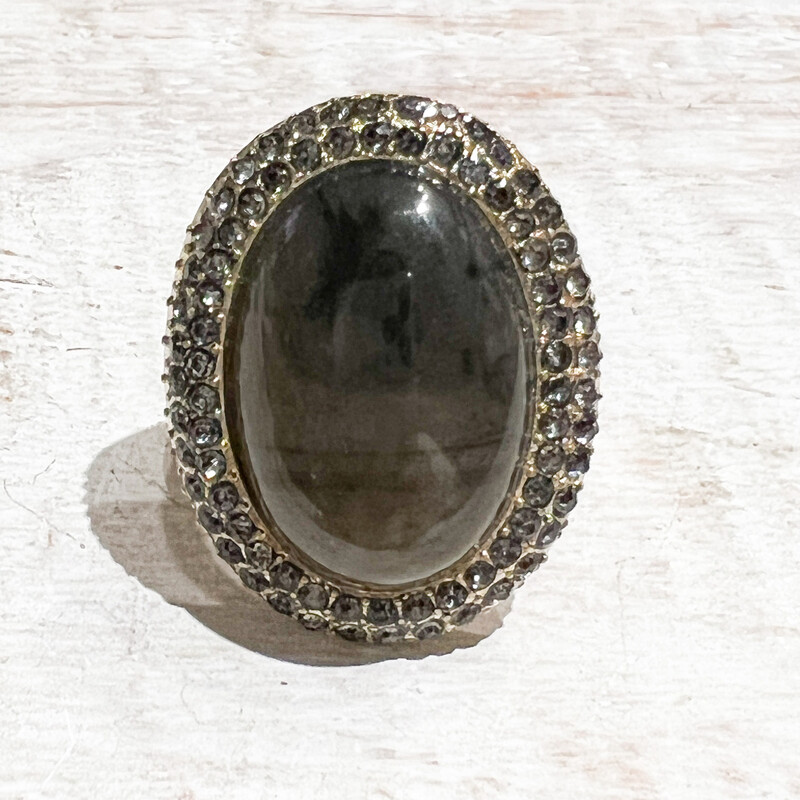 Anillo metal strass y resina grisáceo