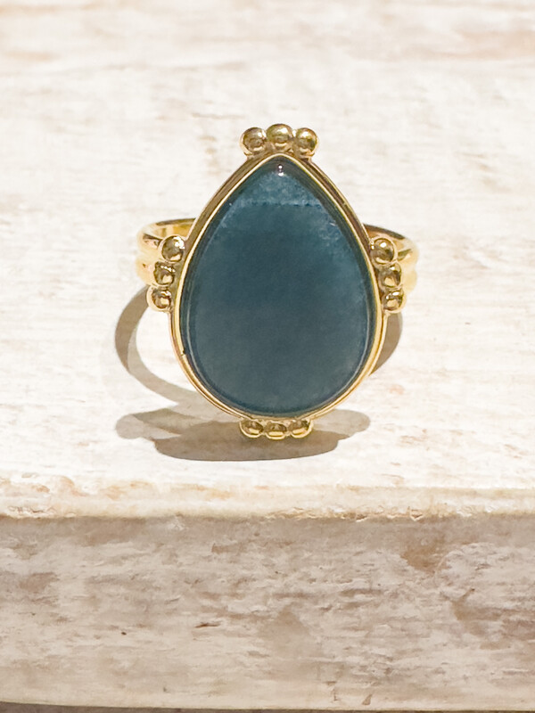 Anillo acero dorado gota apatita