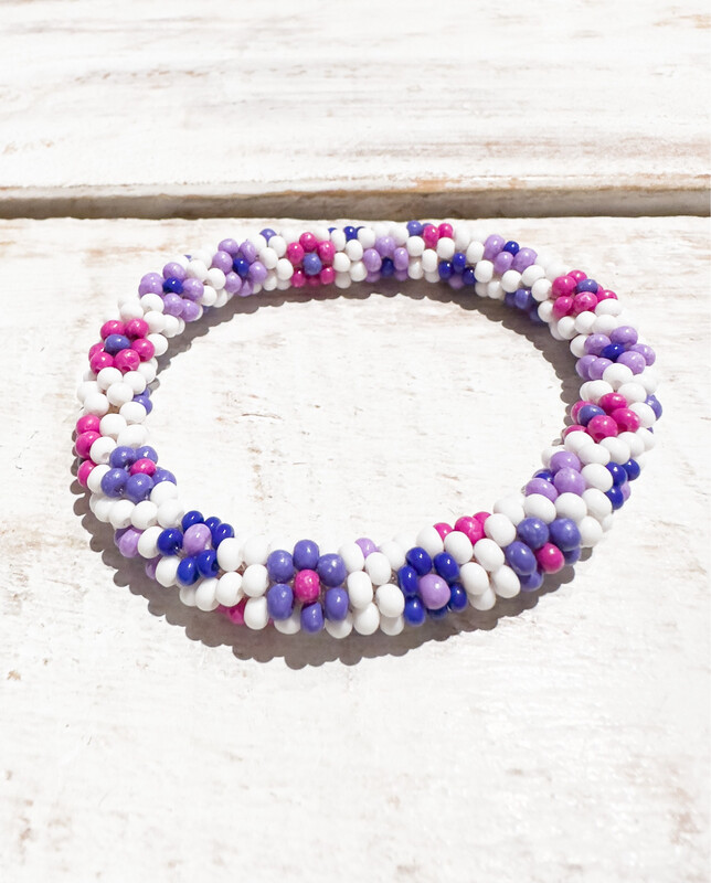 Pulsera redonda elástica flores moradas