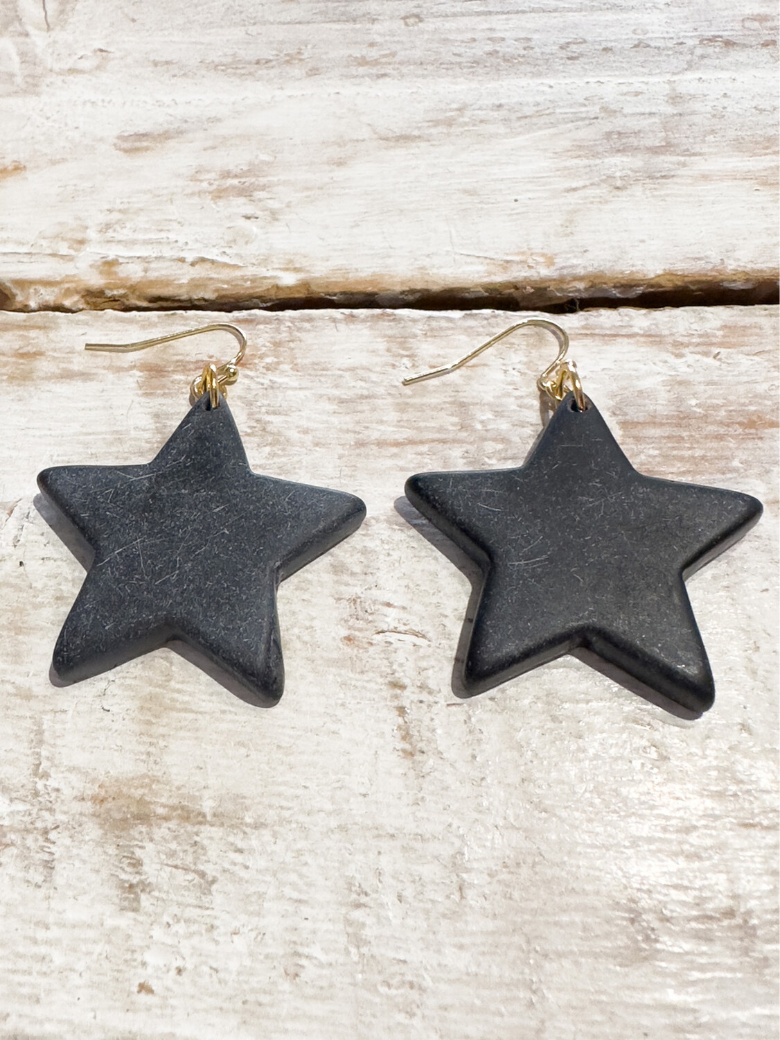 Pendientes estrella resina negros