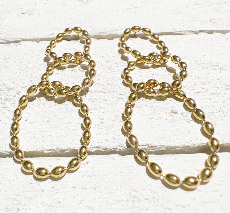 Pendientes acero dorado tres aros bolitas moldeable