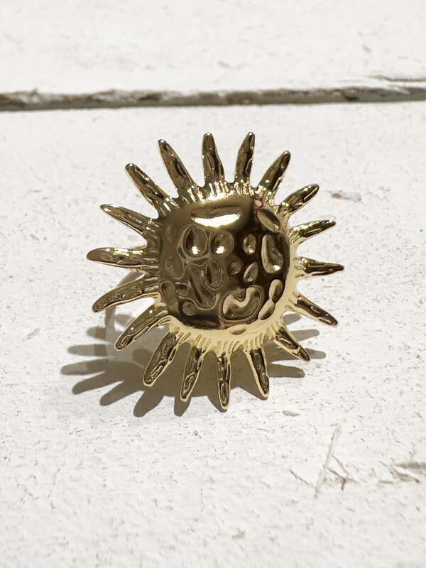 Anillo acero dorado sol