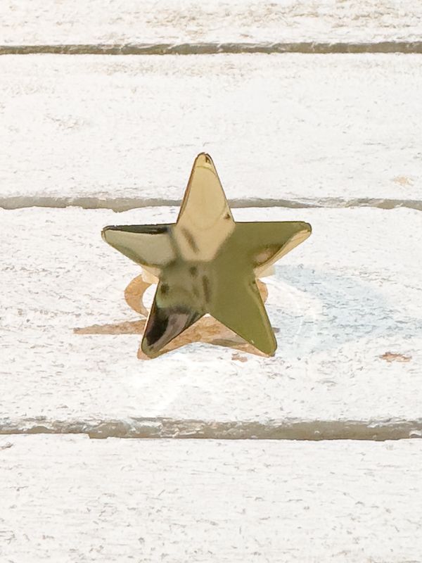 Anillo acero dorado estrella