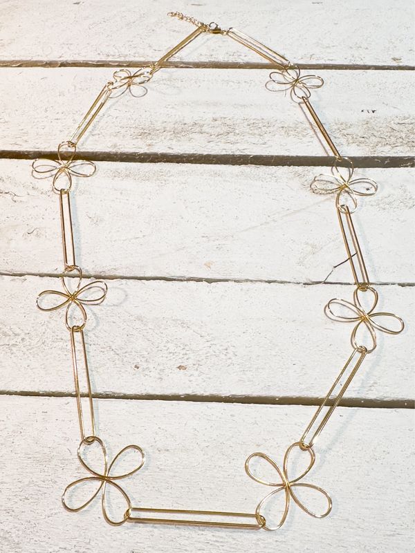 Collar acero dorado silueta flor
