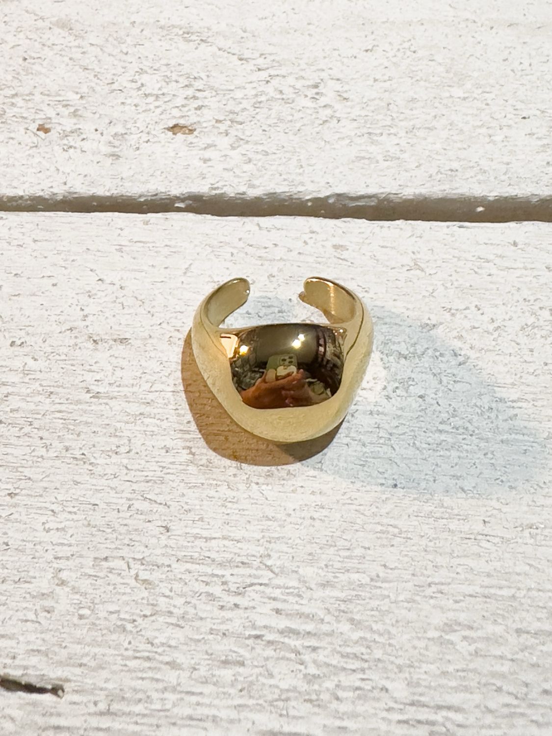 Anillo acero dorado bola