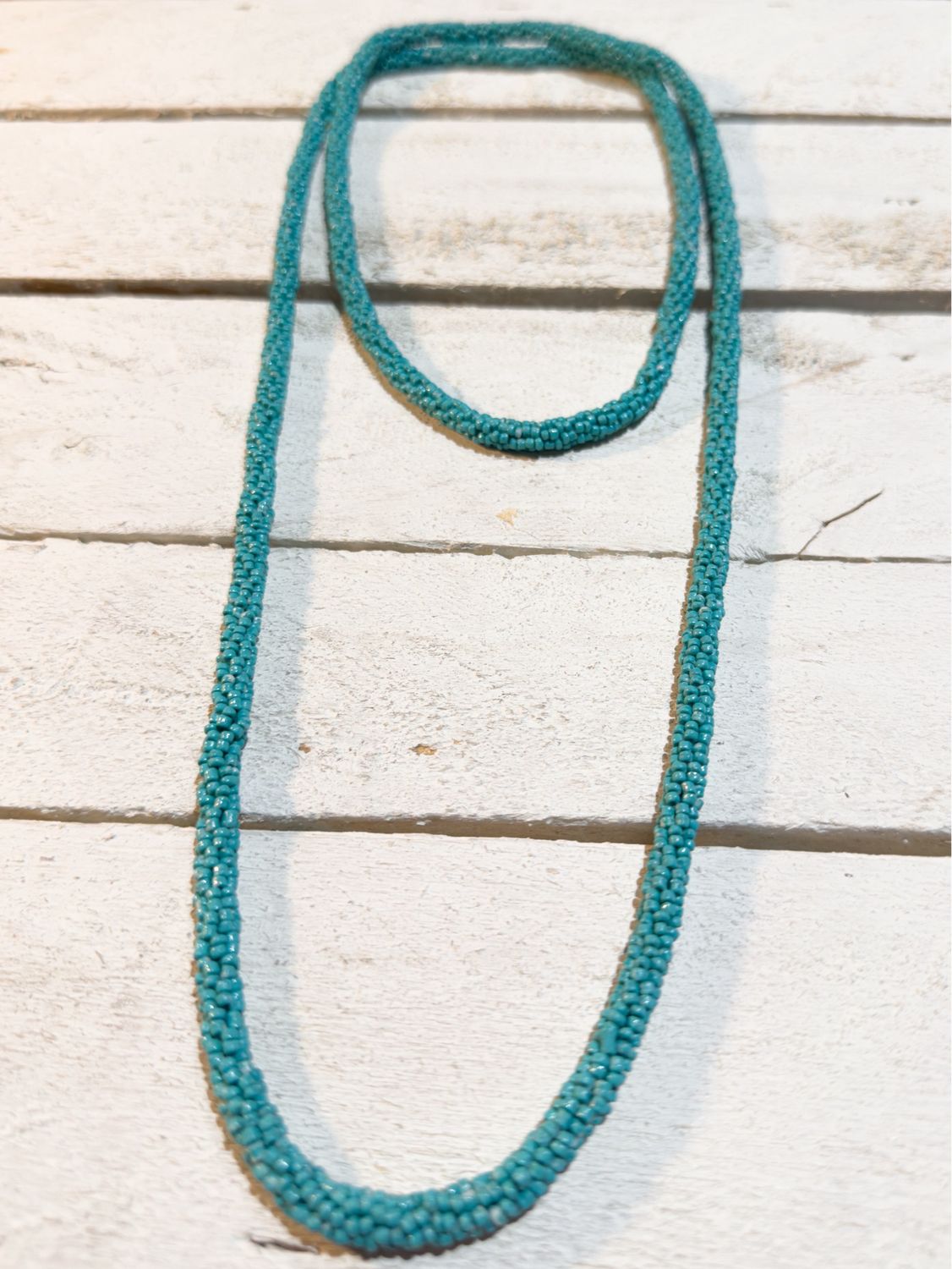 Collar bolitas turquesa