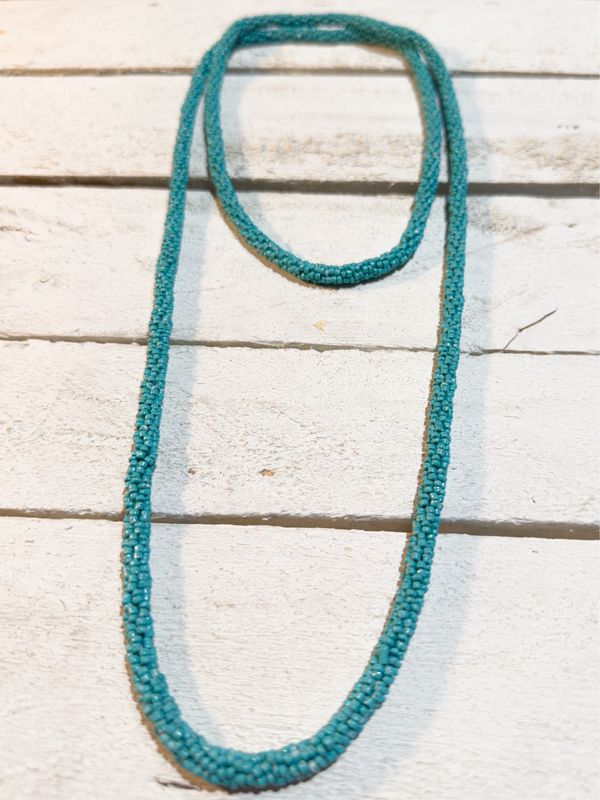 Collar bolitas turquesa