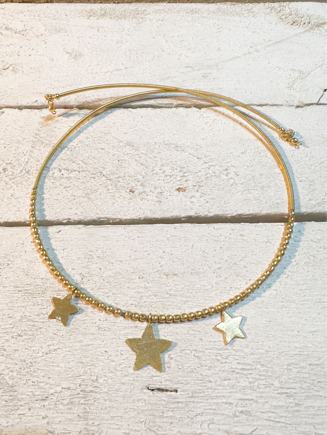 Gargantilla tres estrellas