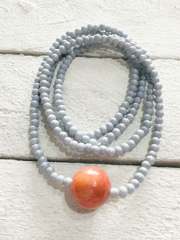 Collar bola gris/teja