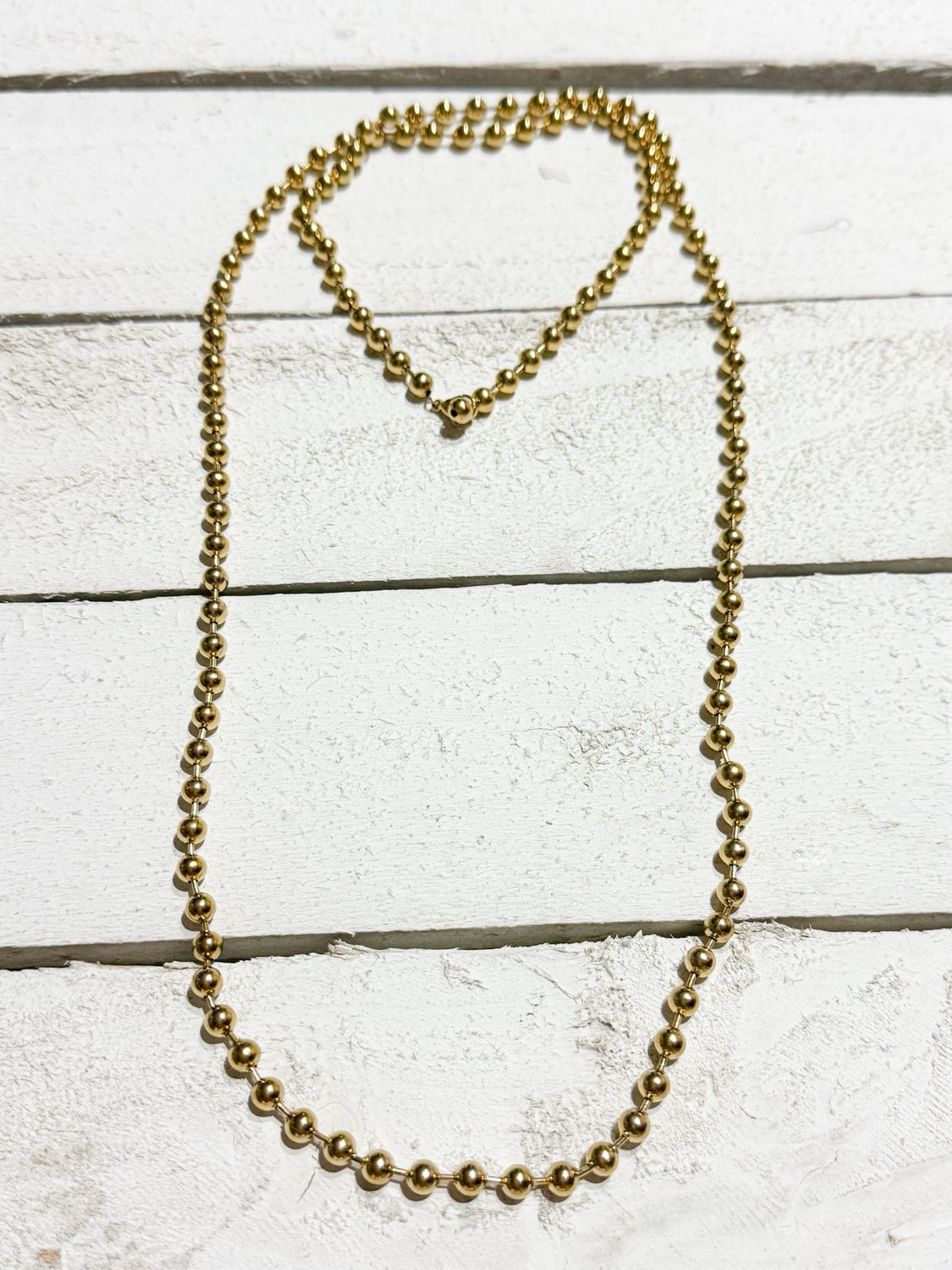 Collar gargantilla bolitas acero dorado