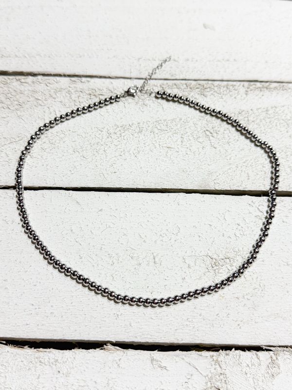 Gargantilla bolitas plateadas acero