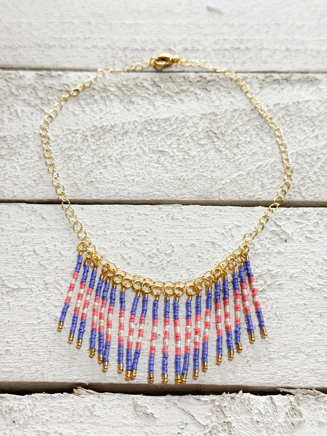 Gargantilla rayas morado/naranja