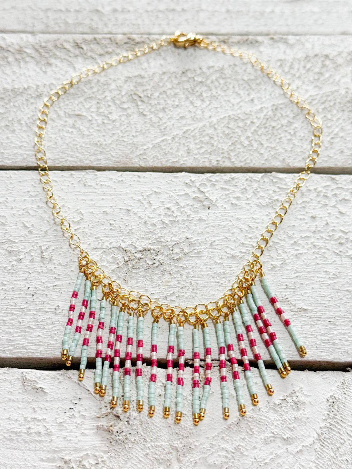 Gargantilla rayas agua/rosa