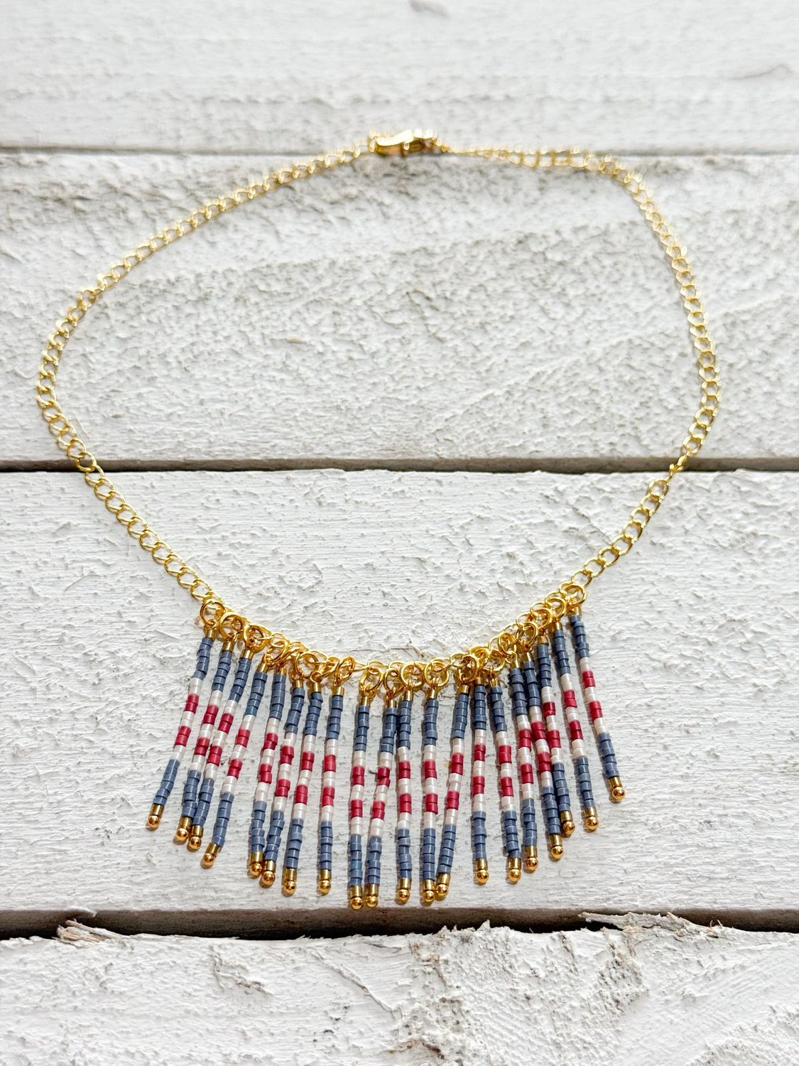 Gargantilla rayas gris/teja