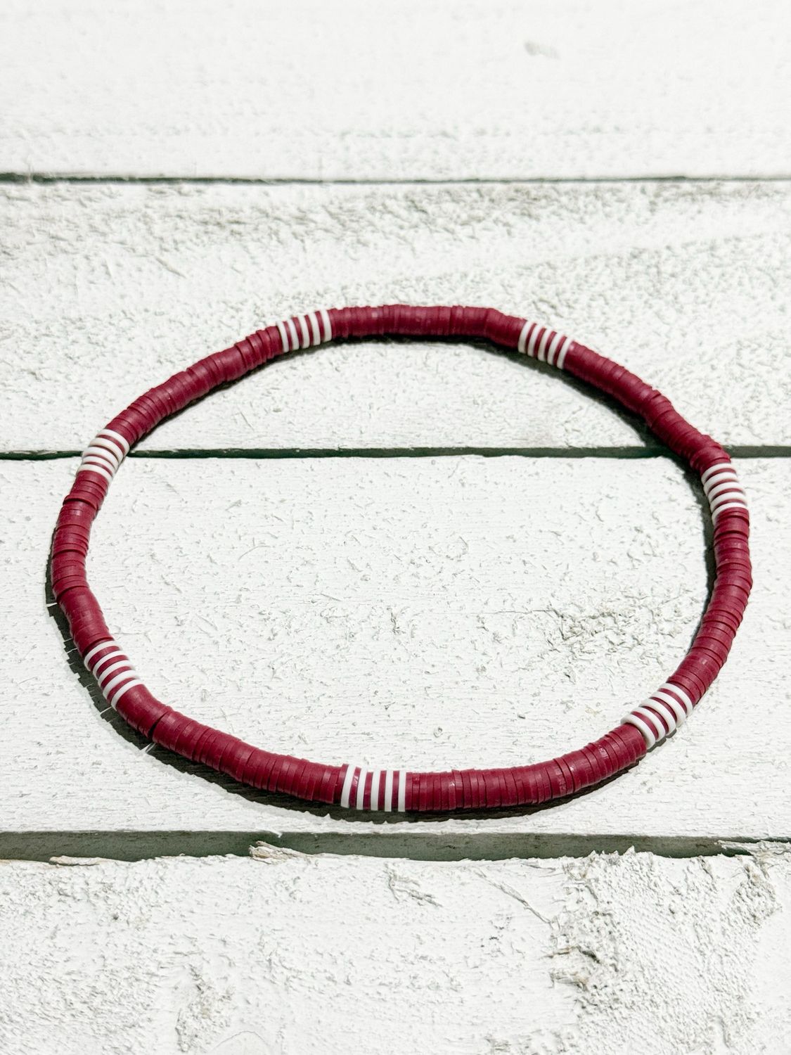 Gargantilla surf rayas rojo guinda