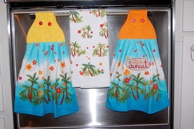 2 beautiful *Lets do Sunset* tie kitchen towels and one hand kitchen towel
