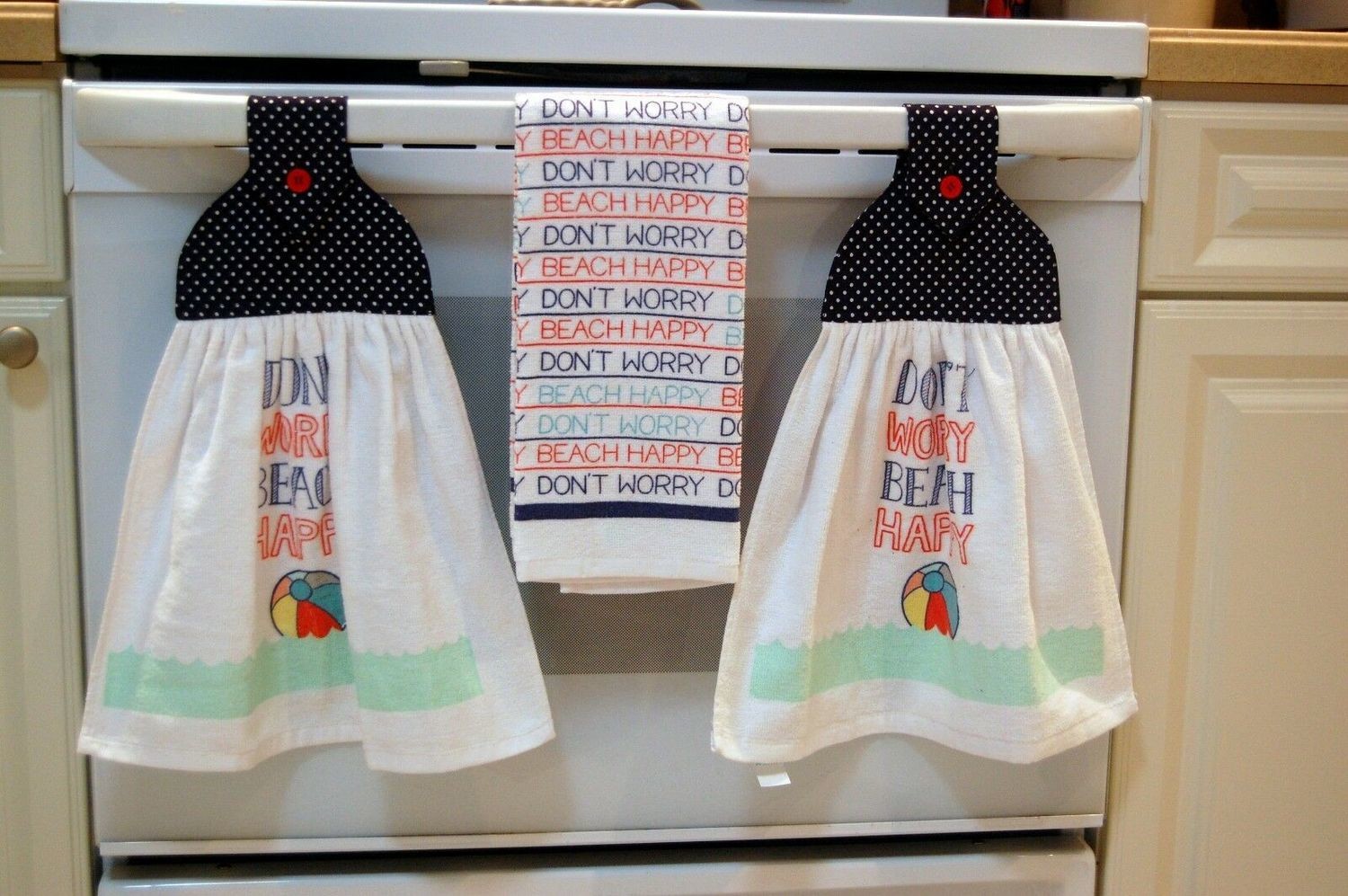 2 beautiful *Dont Worry Beach Happy* tie kitchen towels and one