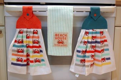 2 beautiful *Beach house no crabs* tie kitchen towels and one hand kitchen towel