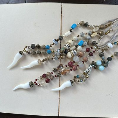 Corno portafortuna in pezzi Unici Corno portafortuna in pezzi Unici