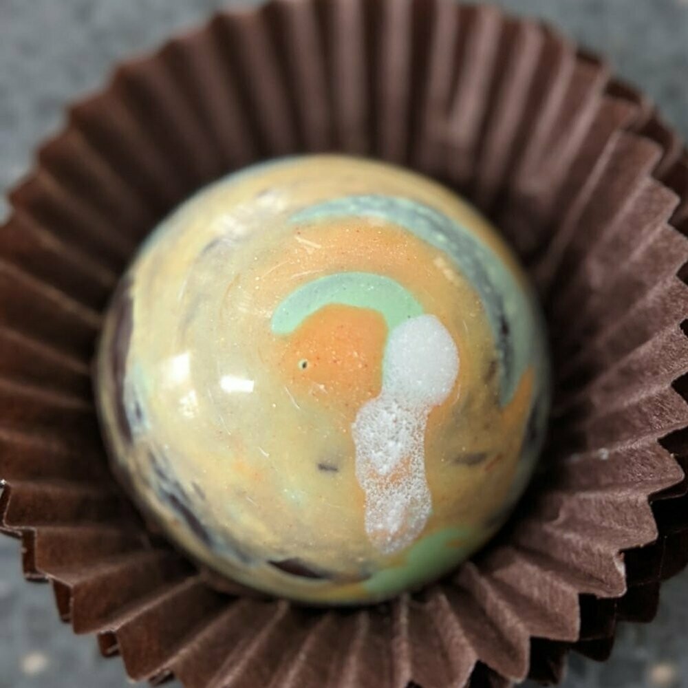 Rum Truffle with a Mango & Lime reduction (Dark Chocolate)
