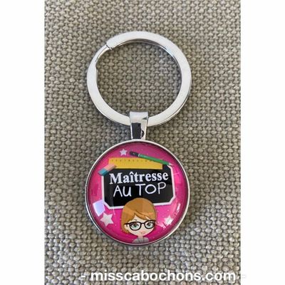 Porte-clé double cabochons institutrice