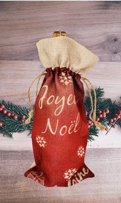 Sac cadeau rouge pour bouteille en tissu Joyeux Noël. A personnaliser avec votre texte.
