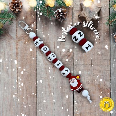 Porte-clés père Noël avec le prénom Porte-clés avec perles en silicones sur le thème de Noël à personnaliser avec le prénom.