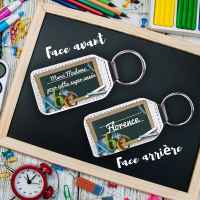 Porte-clés similicuir merci madame Porte-clés en simili cuir sur le thème de l'école avec le texte merci madame pour cette super année.