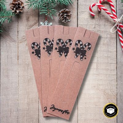 Support en carton pour stylos personnalisé par gravure sur le thème de Noël.