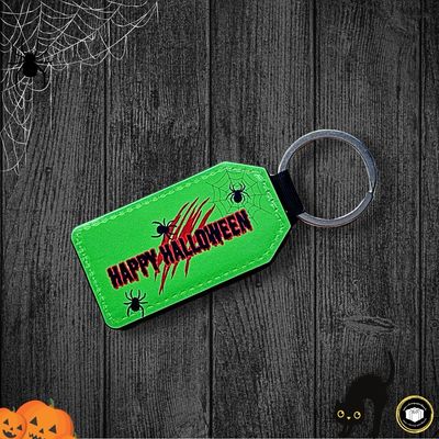 Porte-clés en cuir synthétique vert de très haute qualité personnalisable sur deux faces pour Halloween.